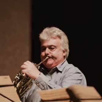 Richard Watkins on horn performing with The Nash Ensemble