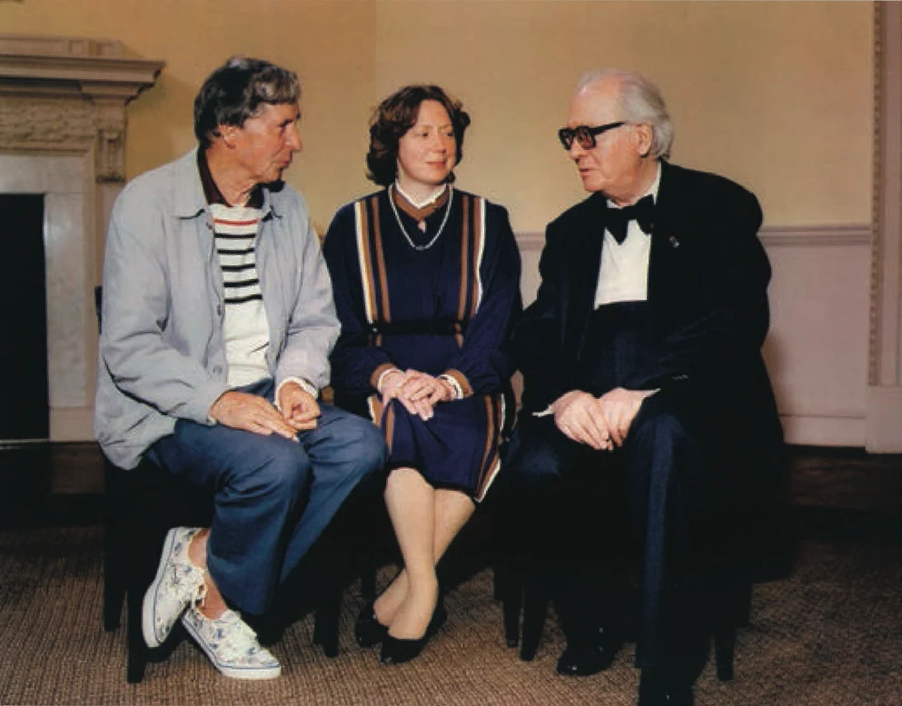 Amelia Freedman seated with two companions in an archival photograph.