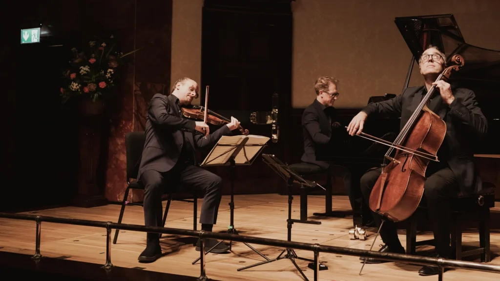 Benjamin Nabarro on violin, Simon Crawford-Philips on piano and Adrian Brendel on cello performing with The Nash Ensemble